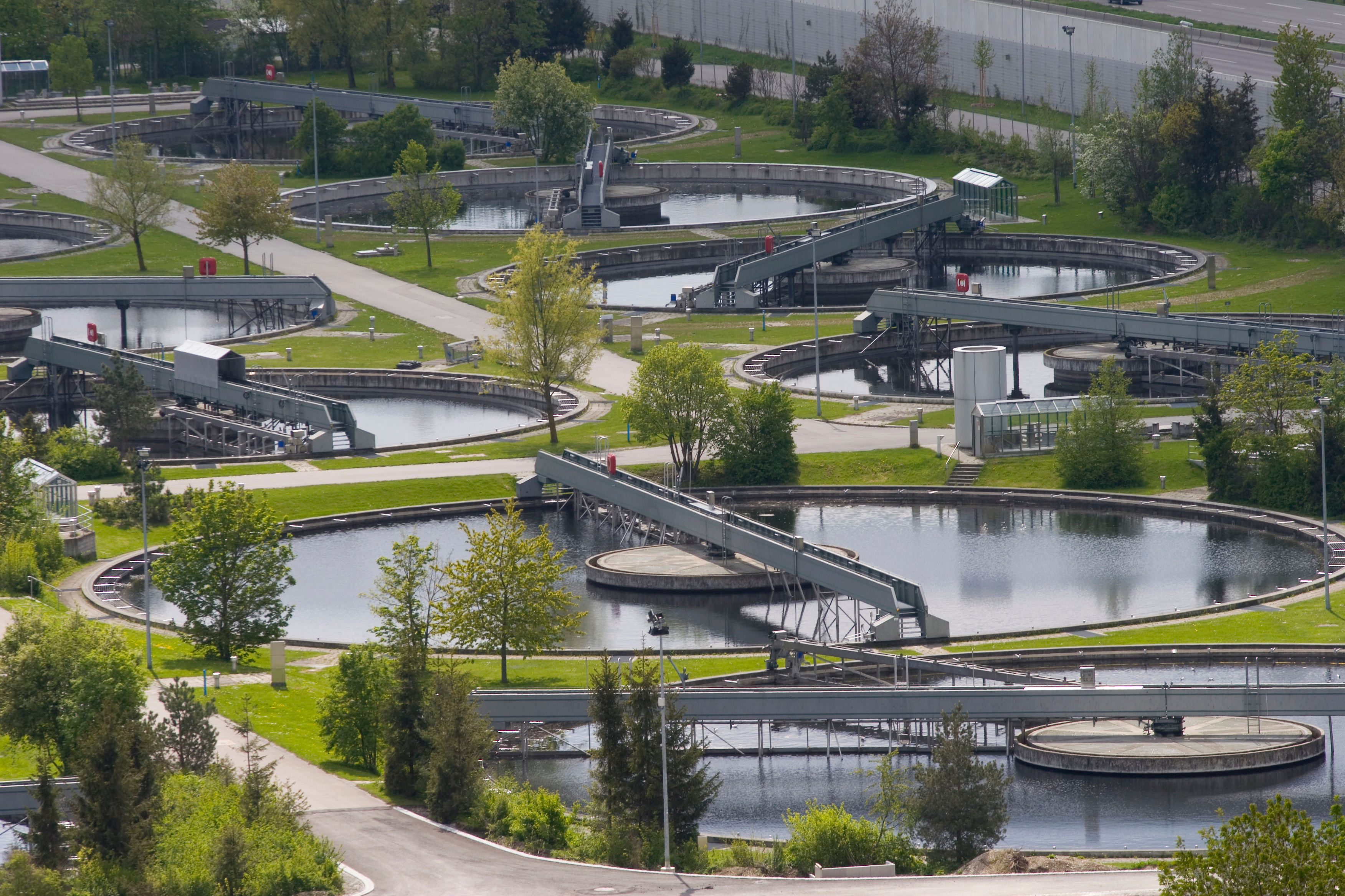 Wastewater treatment facility with multiple basins where odour emissions may be measured and assessed in relation to environmental requirements.